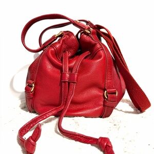 The Sak Bright Red Pebbled Leather Drawstring Shoulder/Crossbody/ Satchel bag